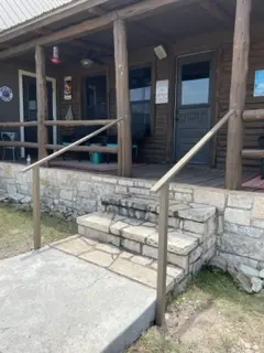 Custom welded handrail installation on a Hill Country property